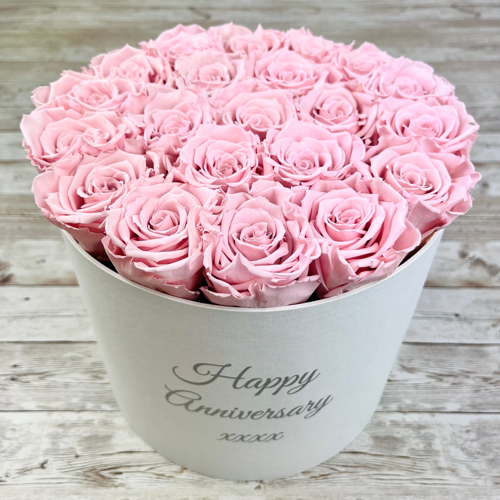 Large Round White Infinity Rose Box - Pink Eternal Roses - One Year Roses - model holding box - Rose Colours divider-Petal Pink
